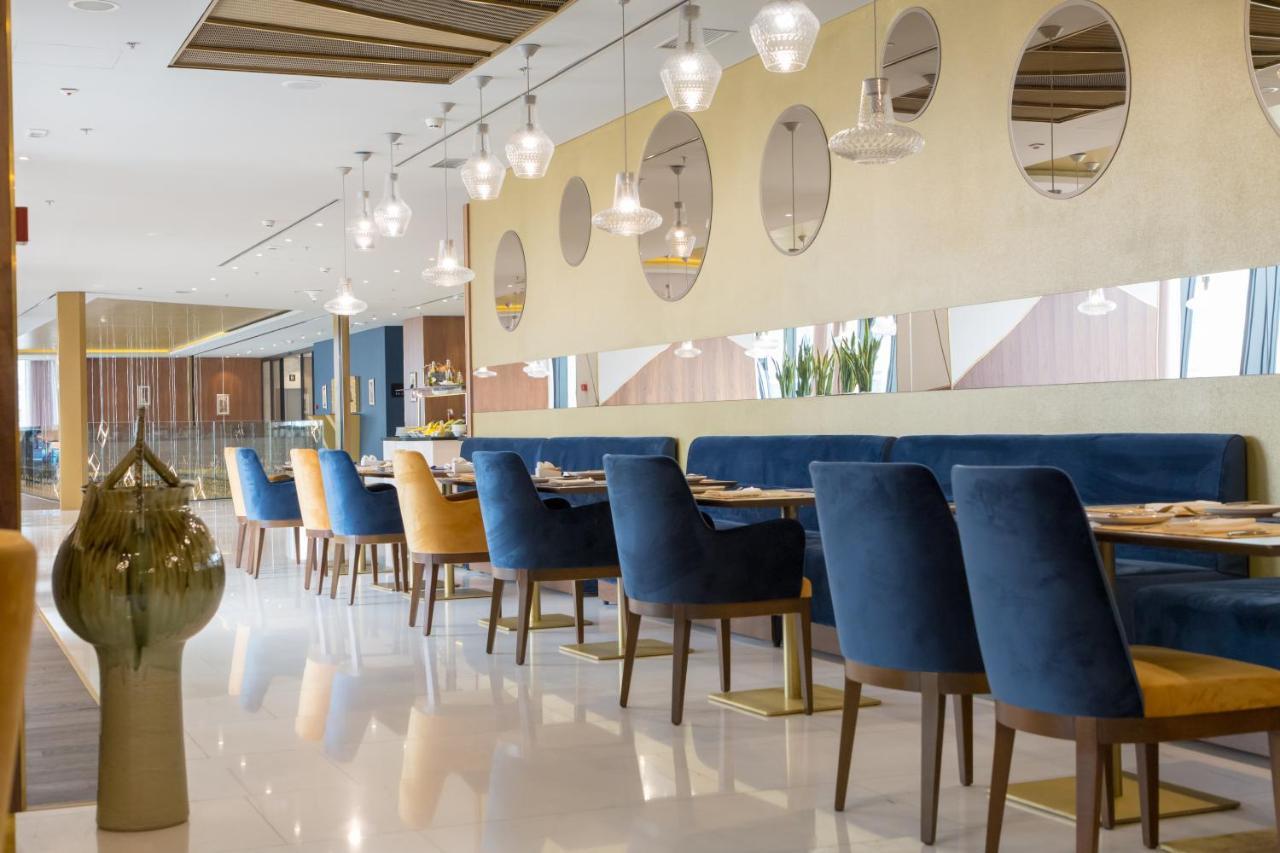 Swissotel Sarajevo Bagian luar foto The restaurant