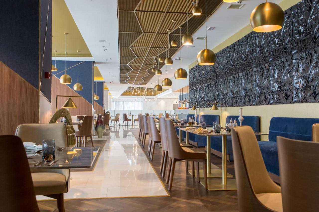 Swissotel Sarajevo Bagian luar foto The interior of the restaurant